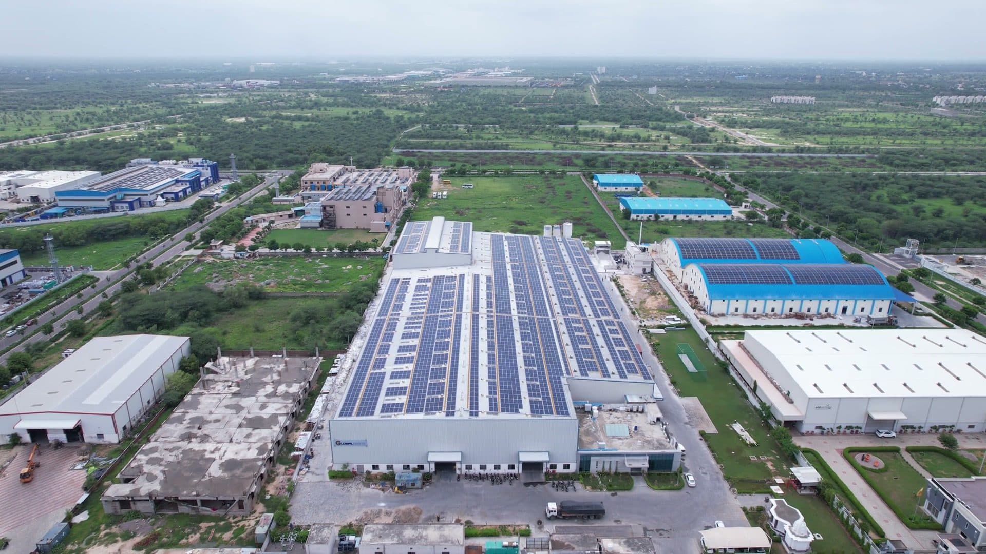 Aerial drone footage of the 1,300 kW rooftop solar layout at SEZ, Jaipur
